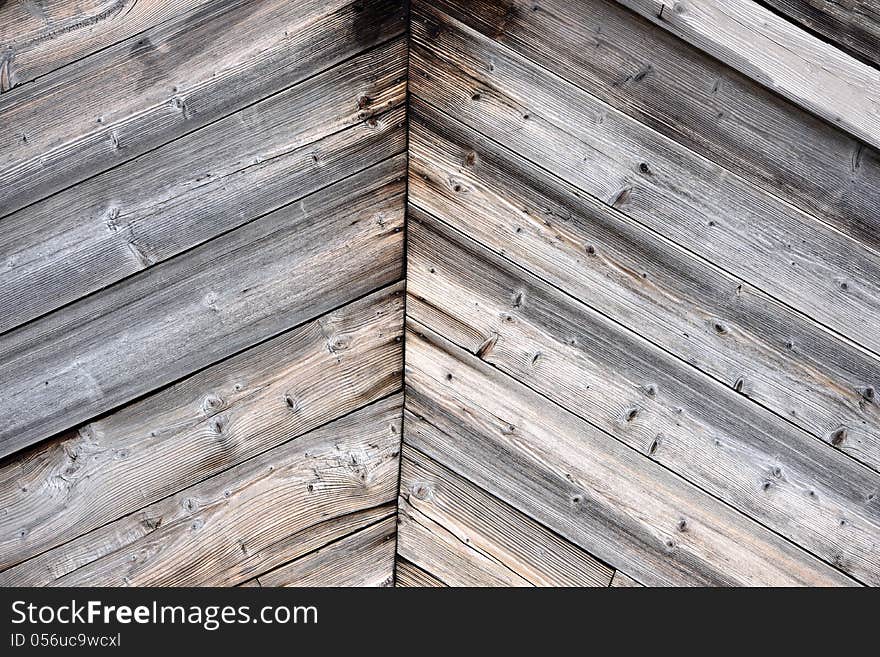 Symmetrical old wooden wall background. Symmetrical old wooden wall background