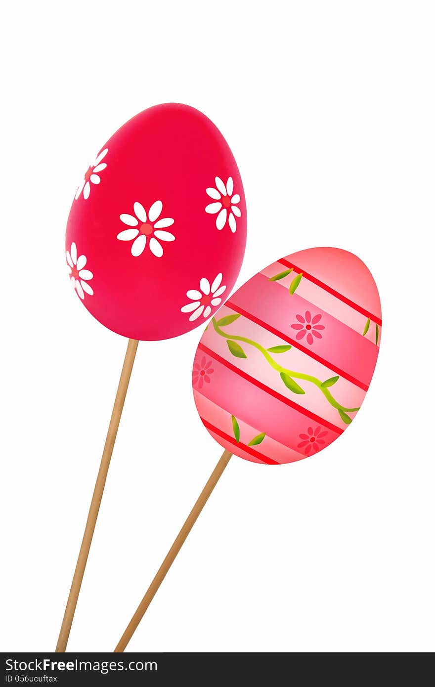 Two colorful Easter eggs with floral patterns on wooden sticks isolated on a white background