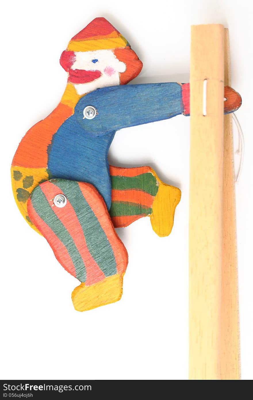 Wooden clown puppet isolated