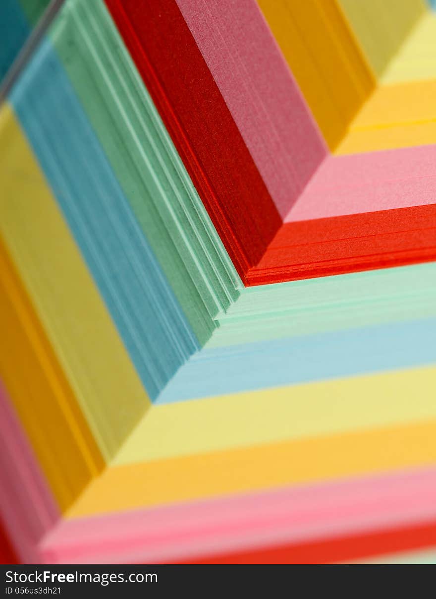 Closeup view of a block of colorful sticky notes. Closeup view of a block of colorful sticky notes.