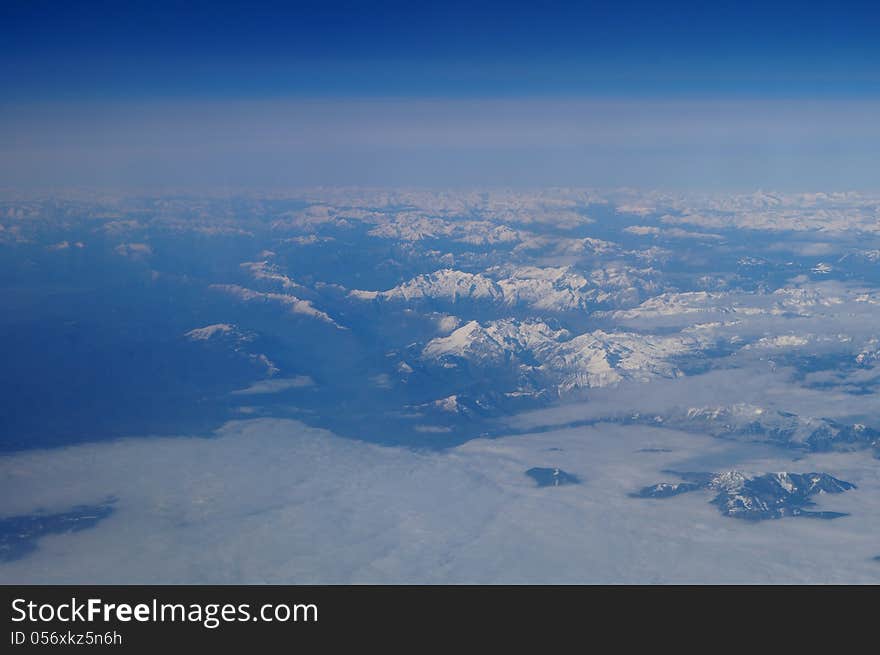 Alpes from plane. evening blue. Alpes from plane. evening blue