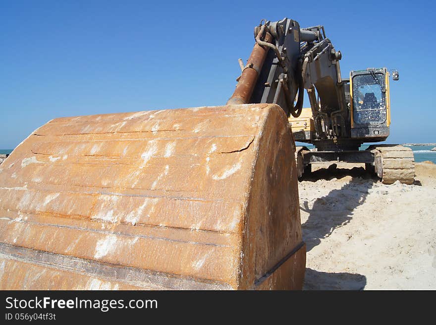 Digger On Beach