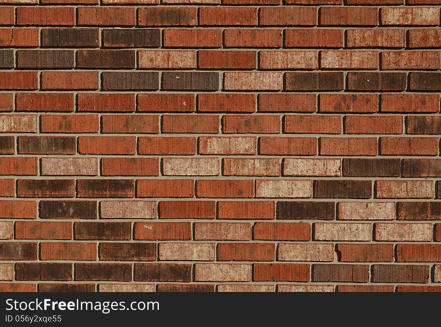 Wall made of different shades of brick. Wall made of different shades of brick