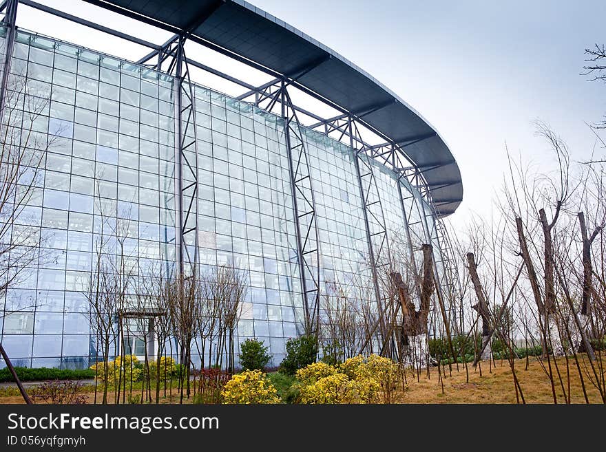 Modern greenhouse building with glass surface