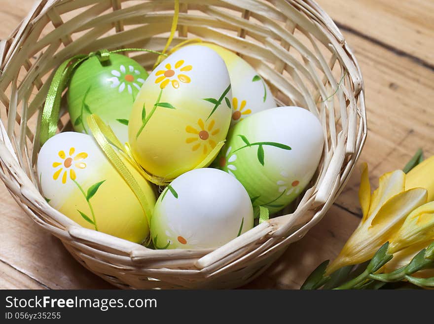 Painted Easter eggs in basket