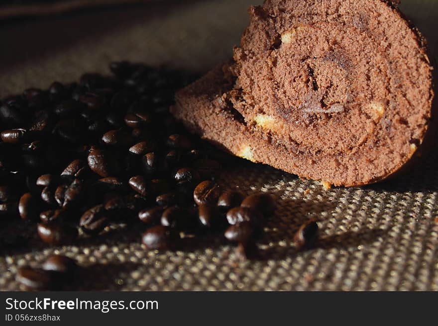 Coffee beans on the background of cake (details)