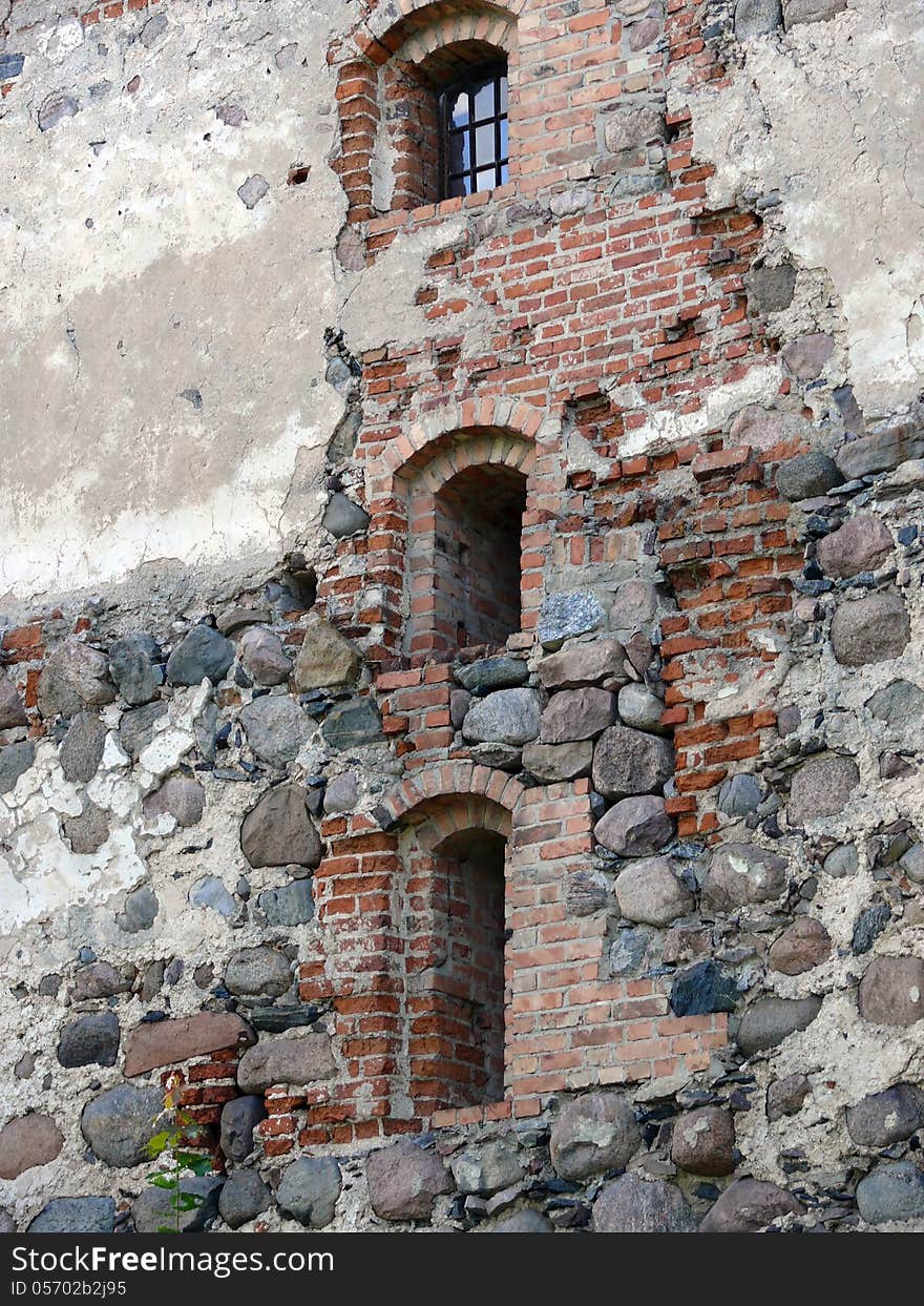 Old wall with windows. Fragment. Trakai Island Castle located in Trakai, Lithuania.