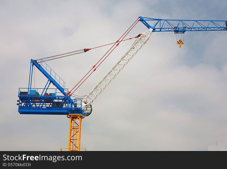 Close up of crane on blue sky with cloud. Close up of crane on blue sky with cloud