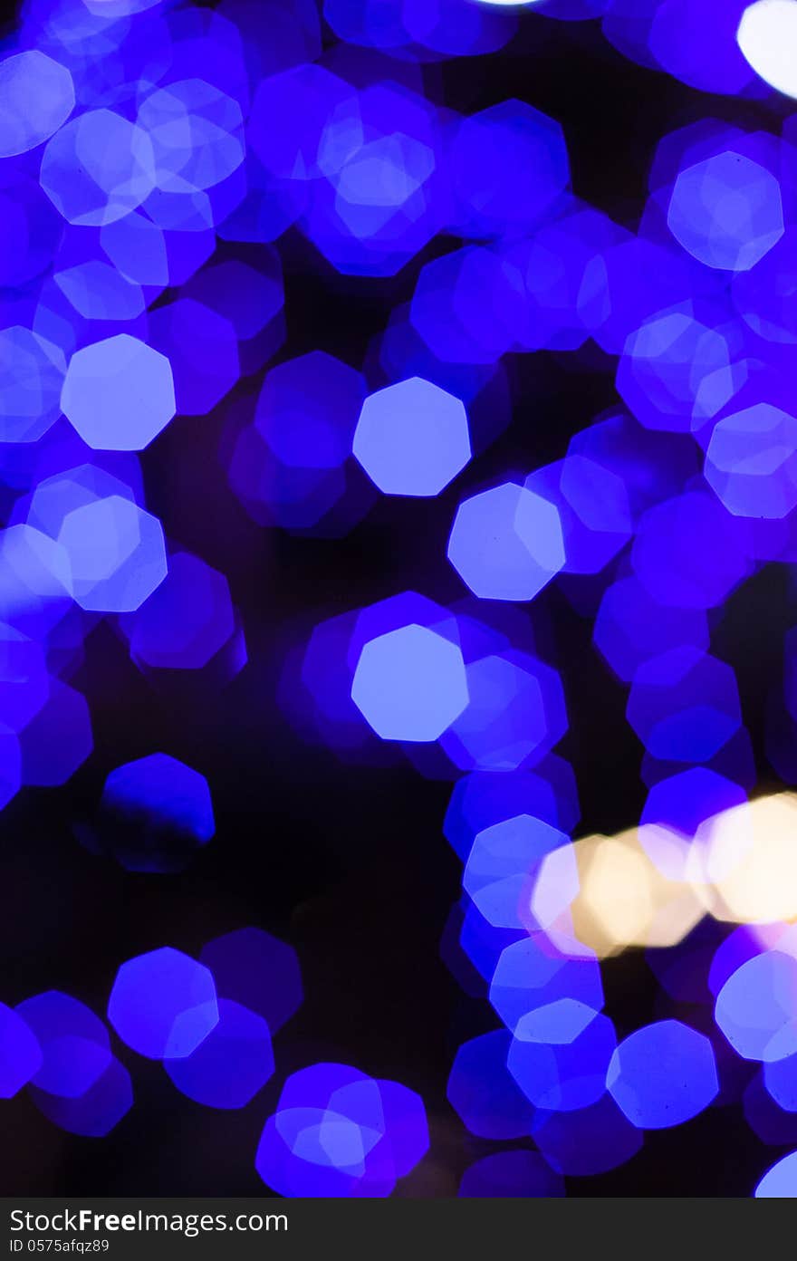 Defocused abstract blue new year lights background. Defocused abstract blue new year lights background