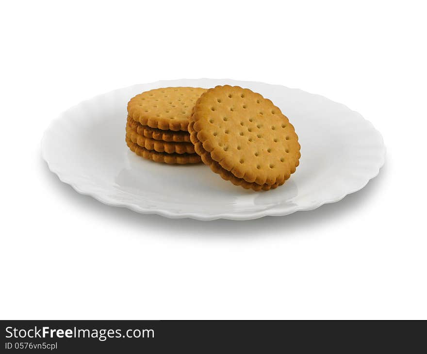 Biscuits on plate isolated on white background.