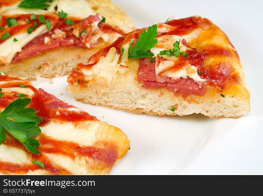 Slice of pizza with salami