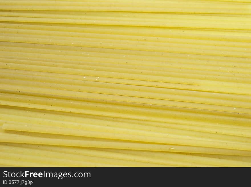 Yellow crude italian pasta texture. Yellow crude italian pasta texture