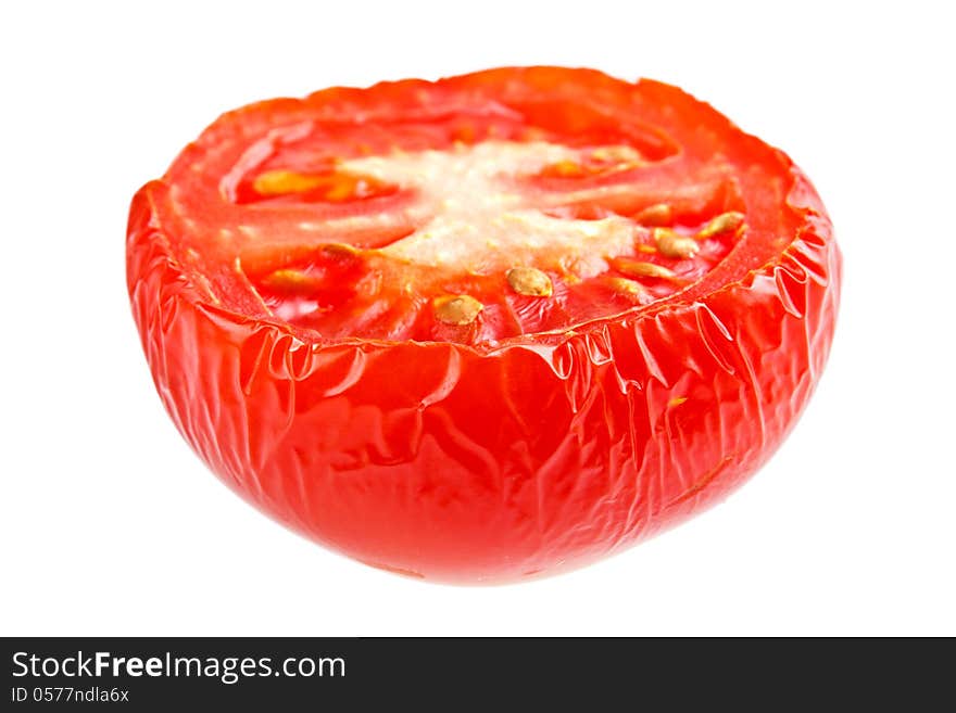 Wrinkled half tomato , isolated on white. Wrinkled half tomato , isolated on white