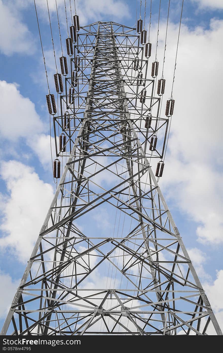 A high- voltage tower with blue sky. A high- voltage tower with blue sky