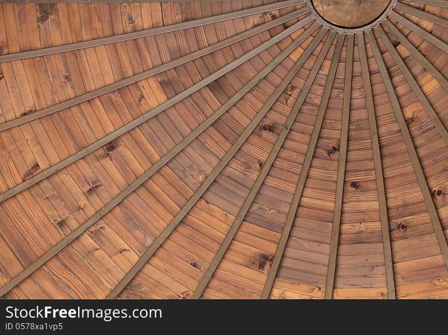 Wooden ceiling in the shape of the sun