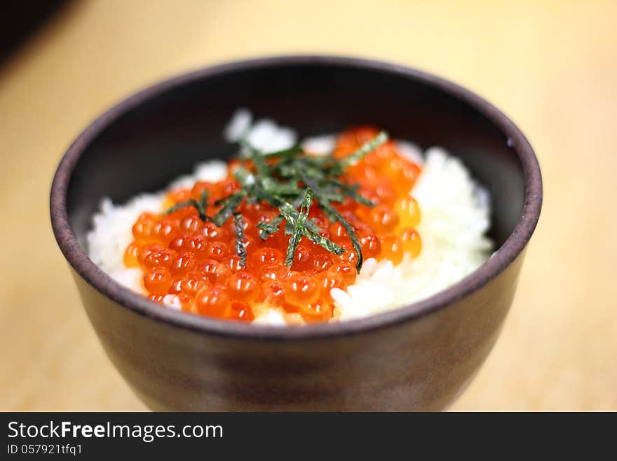 Sushi Rice Bowl filled with Tuna Salmon Prawn Tofu and Vegetables. Sushi Rice Bowl filled with Tuna Salmon Prawn Tofu and Vegetables