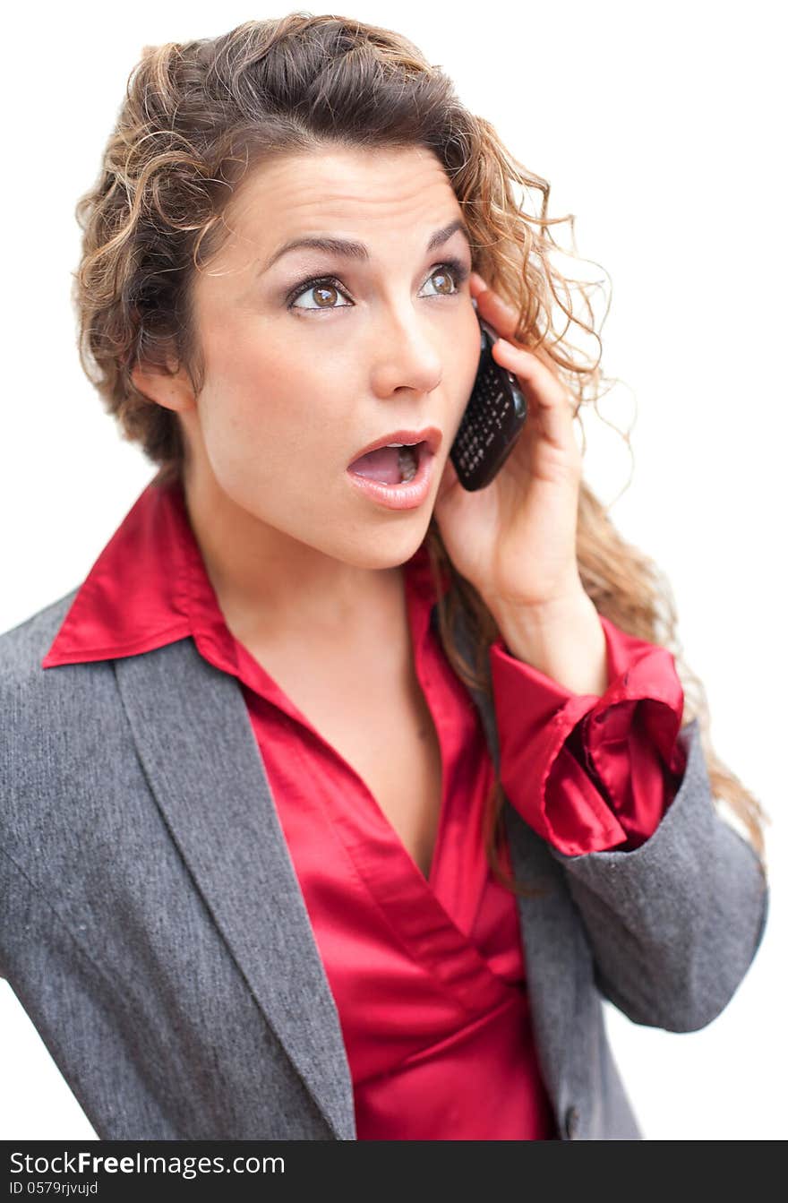 Beautiful Business Woman Talking On Cellphone In Shock