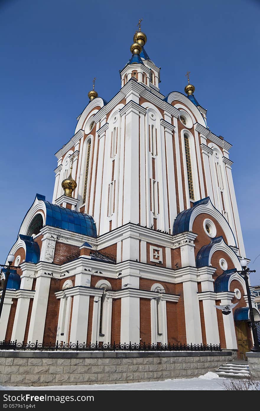 Orthodox church in winter time in sun beams