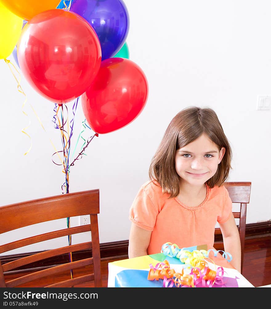 Portrait of a Caucasian little girl at her birthday party. Portrait of a Caucasian little girl at her birthday party