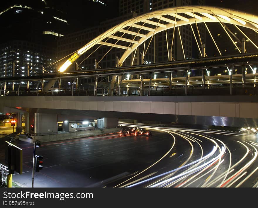 Pubic skywalk with modern buildings of Bangkok downtown square in business zone, Thailand