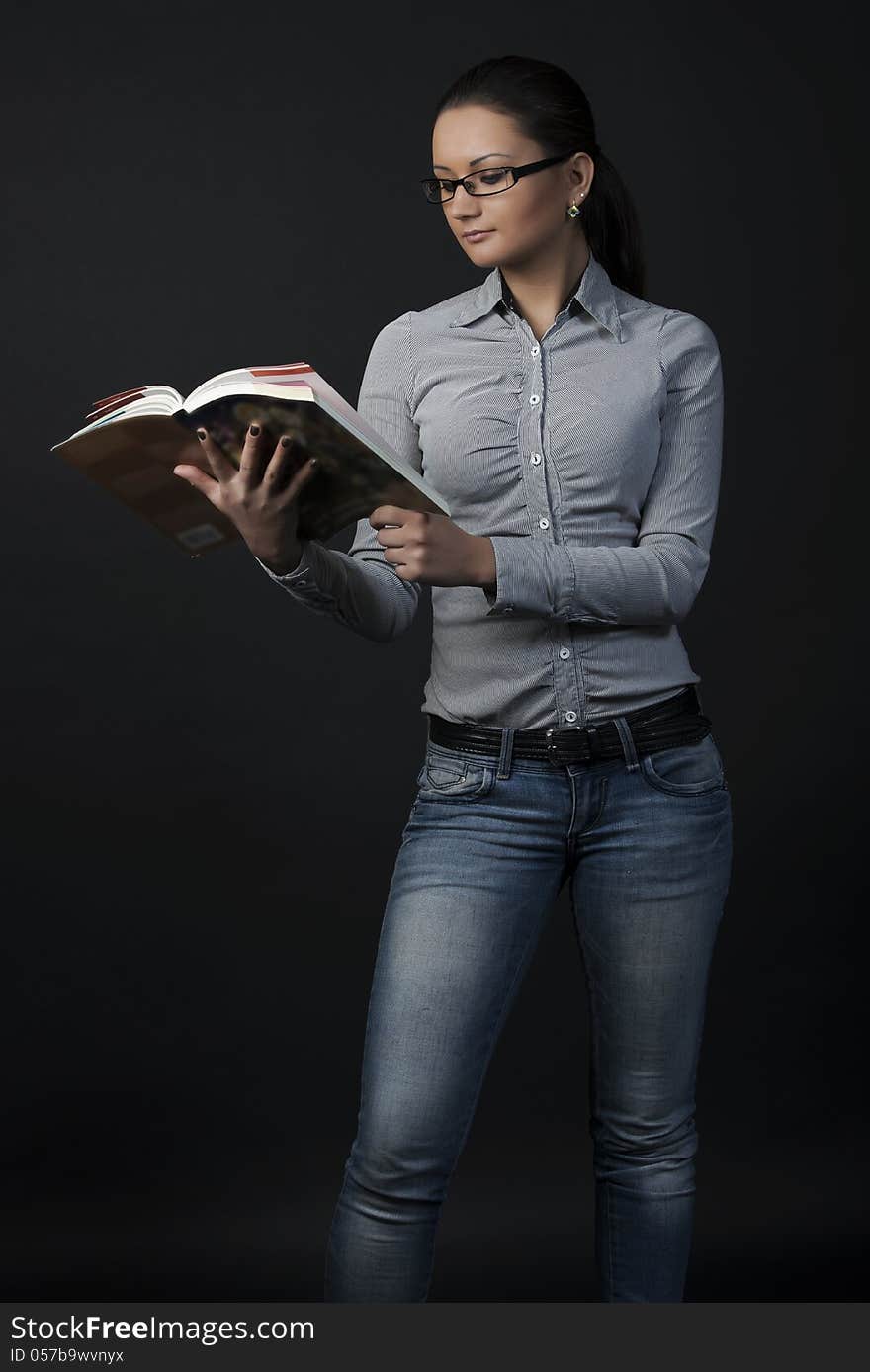 Beautiful Young Woman Standing With Book Open. Beautiful Young Woman Standing With Book Open