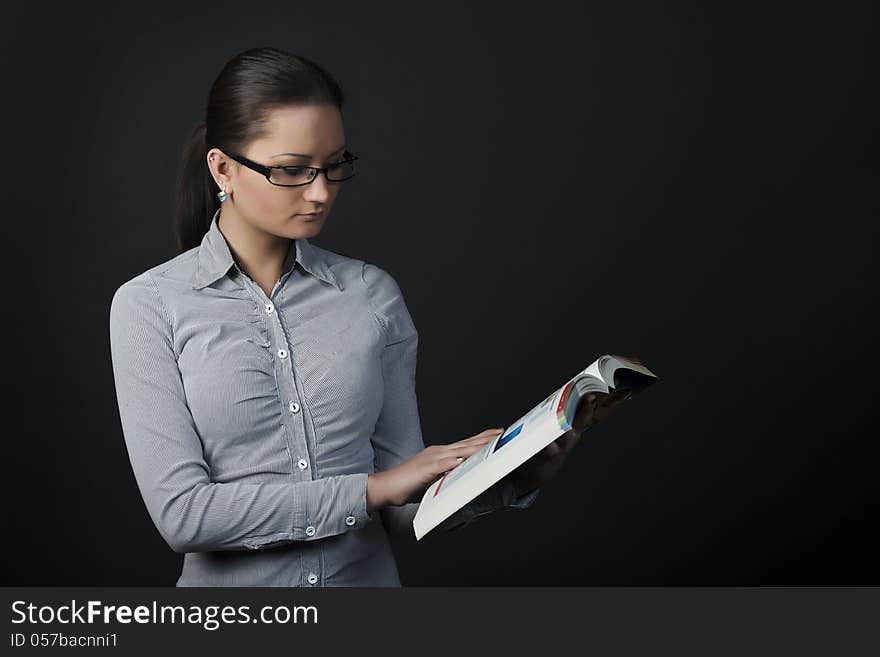 Beautiful Young Woman Standing With Book Open. Beautiful Young Woman Standing With Book Open