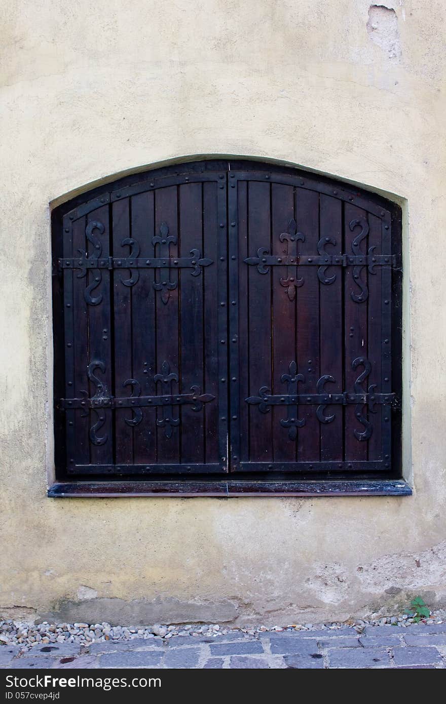 Dark brown detailed old window frame. Dark brown detailed old window frame