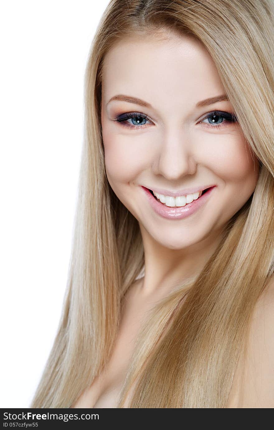 Beautiful smiling blonde on a white background