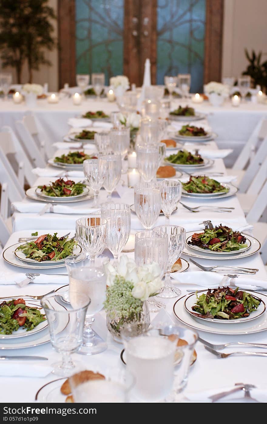 Vertical: Salads Served on White Table Cloth for Wedding Reception