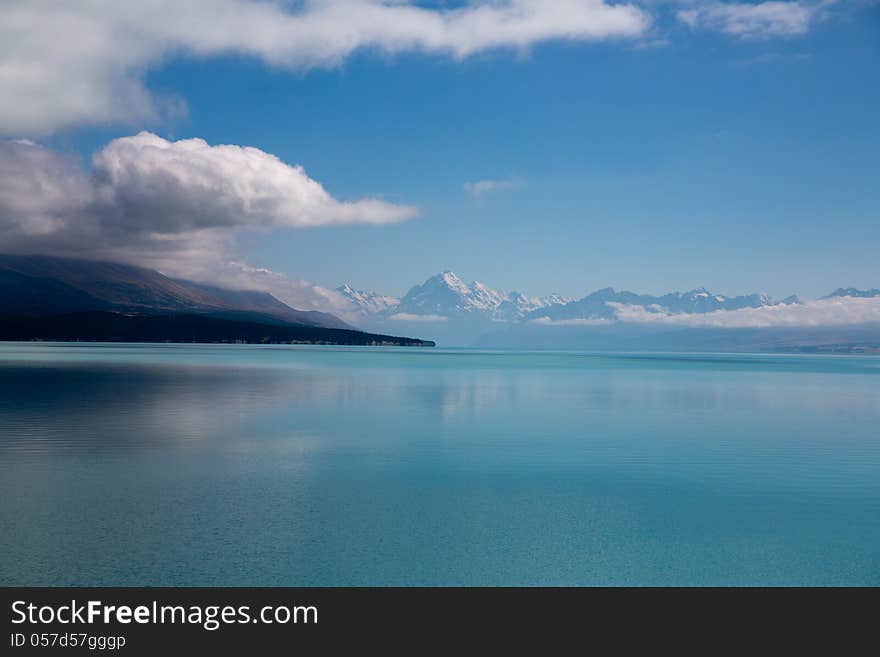 A lake near the mount cook named Lake Pukaki. The water of lake contain mineral. It result the white color. We also can look the mountain cook with snow cover