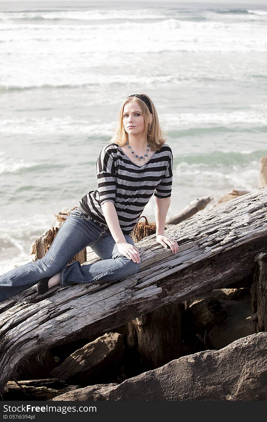 Young Woman With Beautiful Blue Eyes At The Beach