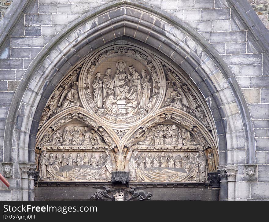 Above the entrance of Old Church Architectural detail St. John's Hospital Museum Brugge. Above the entrance of Old Church Architectural detail St. John's Hospital Museum Brugge