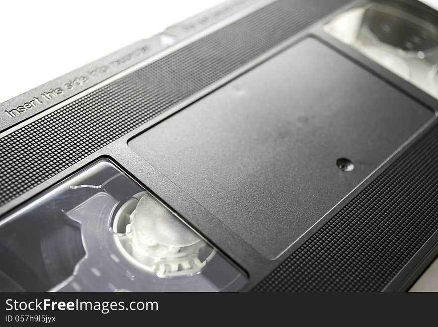 Videocassette on white background closeup