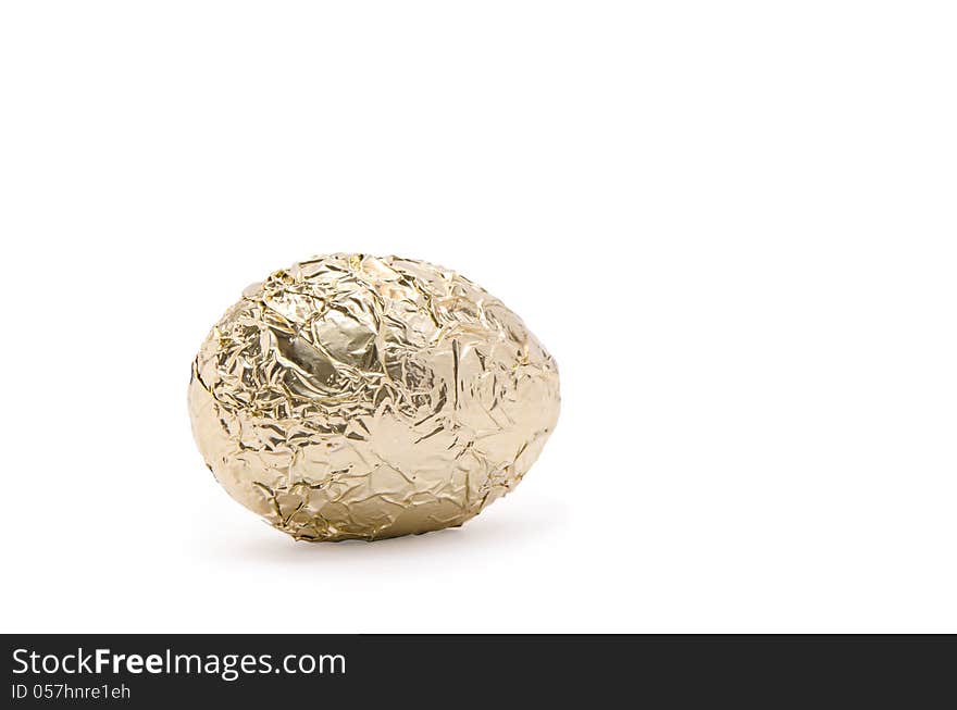 Golden easter egg on white background.Clipping path included. Golden easter egg on white background.Clipping path included.