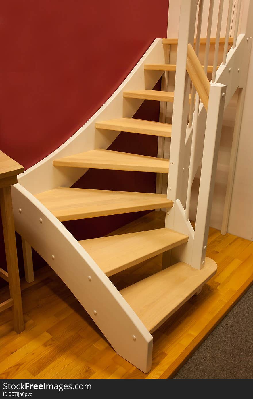 Elegant design wooden stairs staircase in a modern home. Elegant design wooden stairs staircase in a modern home