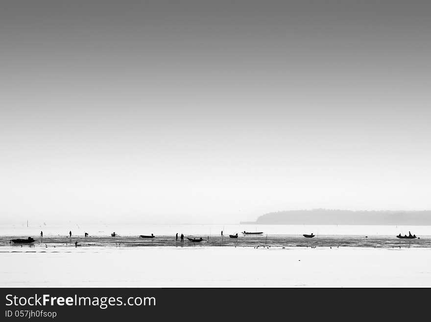 Black and white landscape boat ,people and sea. Black and white landscape boat ,people and sea