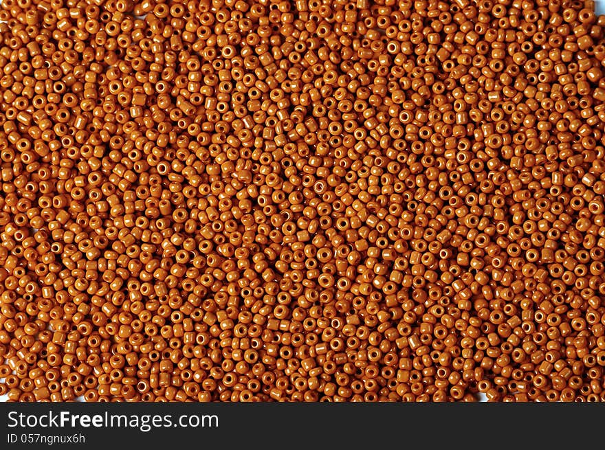 Texture of small orange beads ,suitable for backgrounds