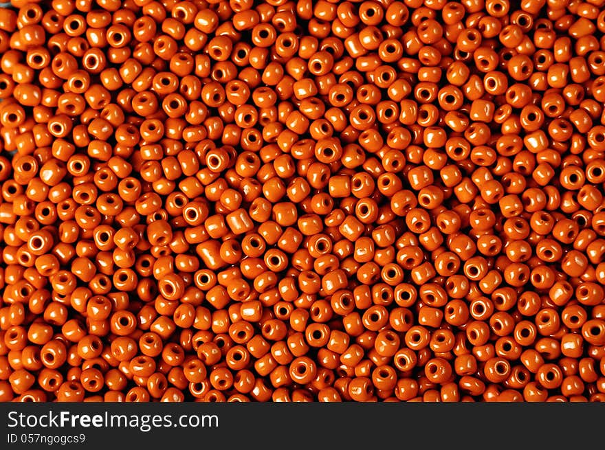 Texture of small orange beads ,suitable for backgrounds