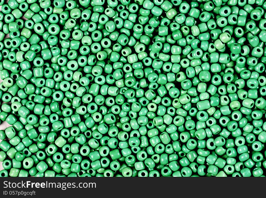 Texture of small green beads ,suitable for backgrounds. Texture of small green beads ,suitable for backgrounds