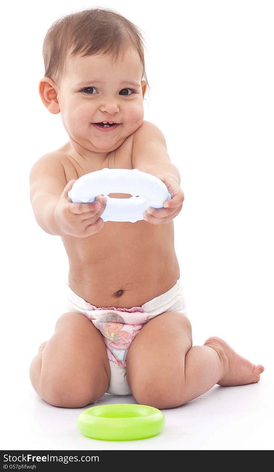 Funny girl with a toy isolated on a white background. Funny girl with a toy isolated on a white background.