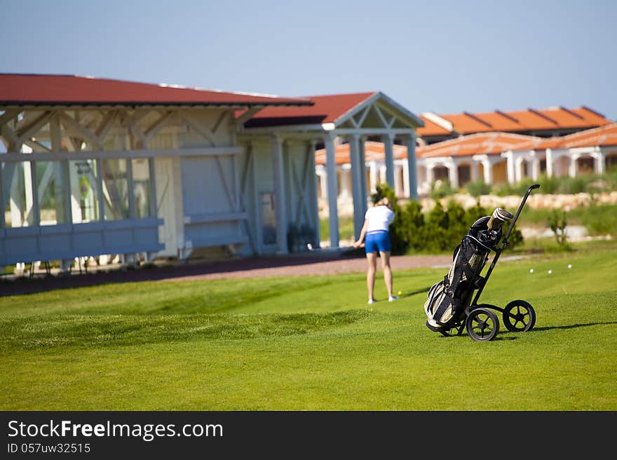 Golf bag. woman playing