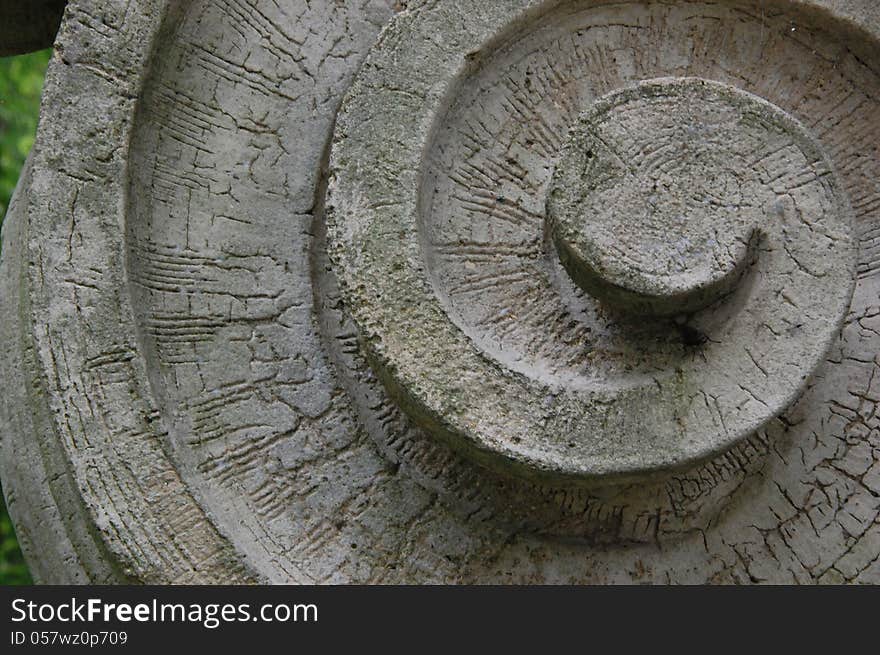 Stone cut spiral element of an architectural piece