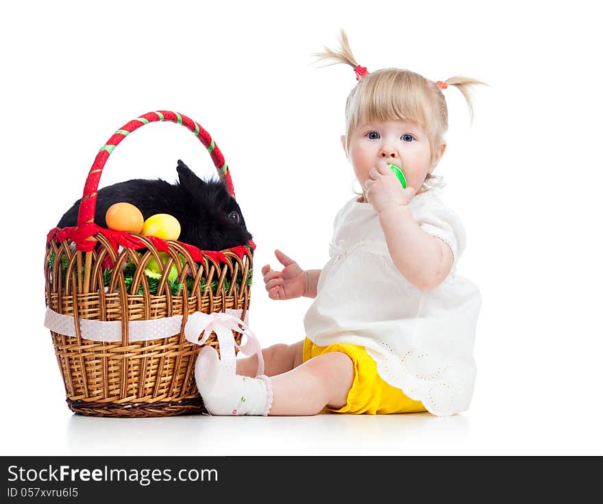 Funny kid girl with Easter bunny in basket. Funny kid girl with Easter bunny in basket