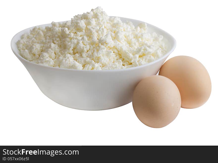 Cottage cheese in white plate with eggs