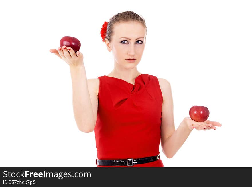 The girl in red dress holding a Apple isolated on white background