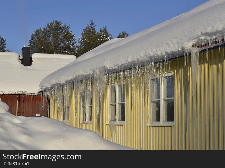 Dangerous icicles hanging from the eaves