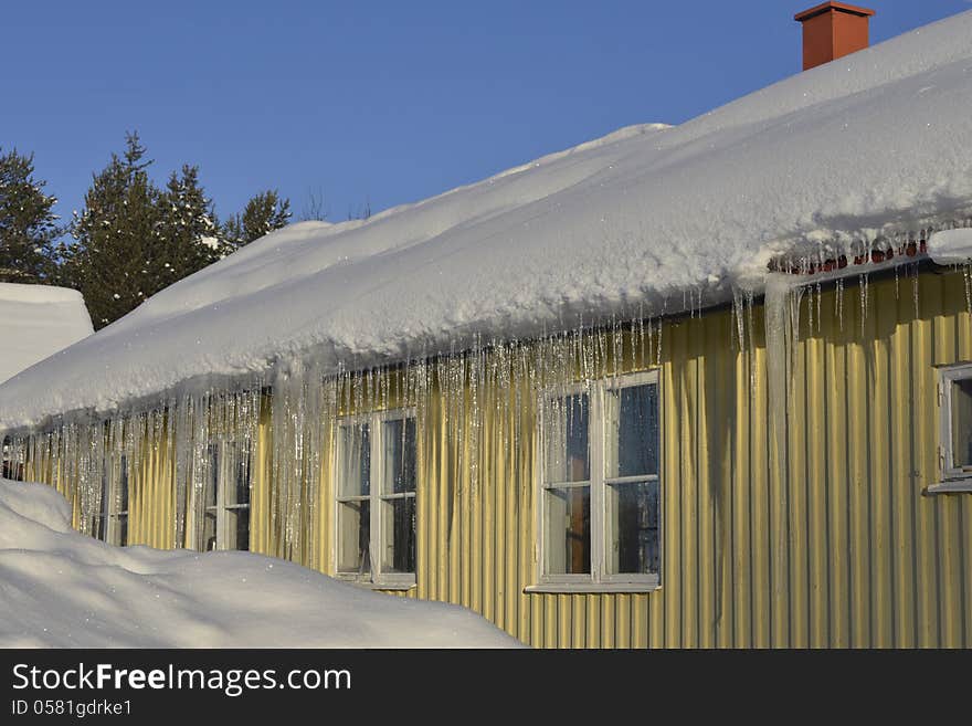 Dangerous icicles hanging from the eaves