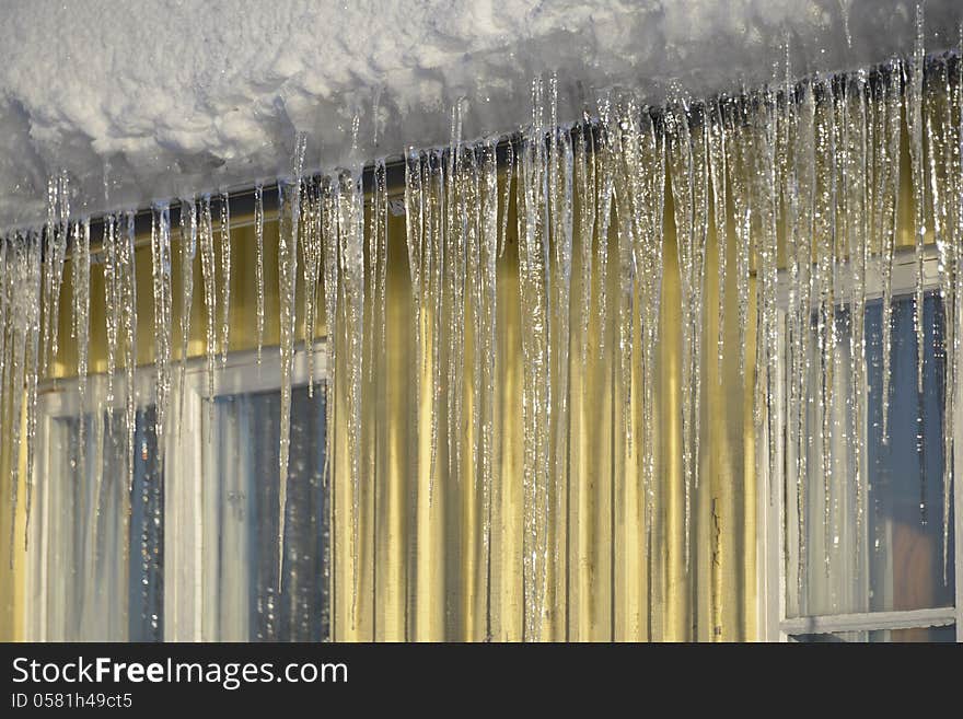 Dangerous icicles hanging from the eaves