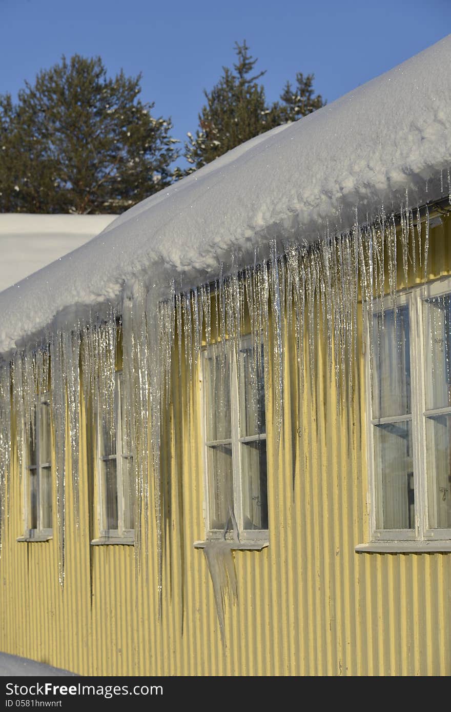 Dangerous icicles hanging from the eaves