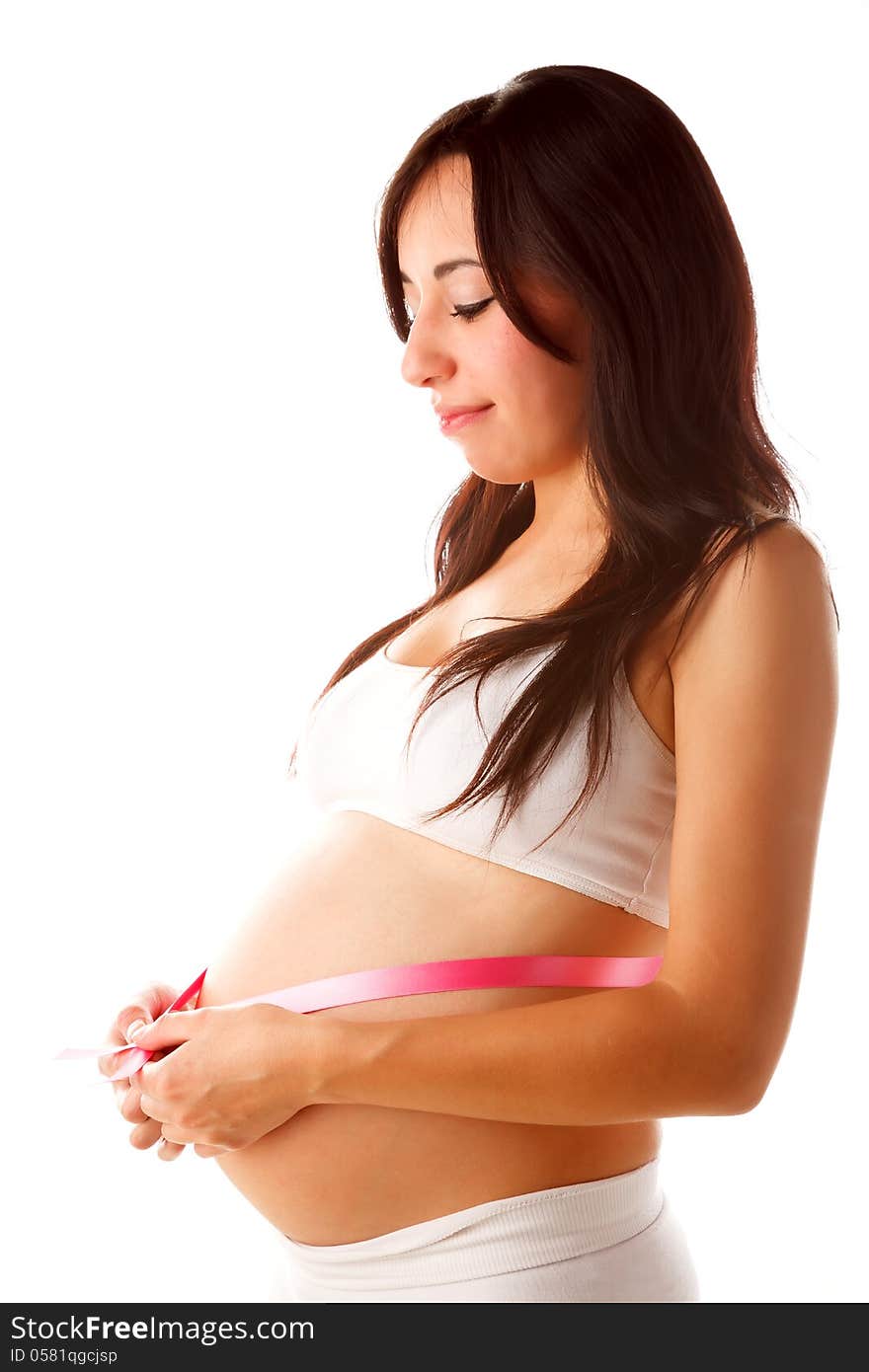 Young latin pregnant woman with rose lace